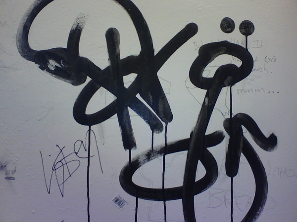 art on a bathroom wall