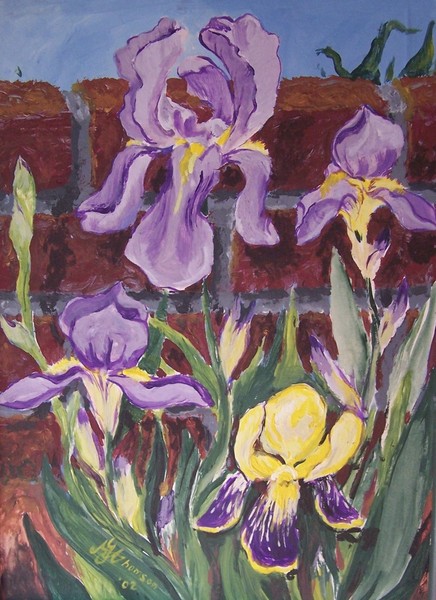 Irises by a Brick Wall