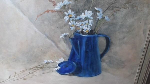 daises in blue enamel coffeepot