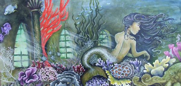 Mermaid amongst a coral garden