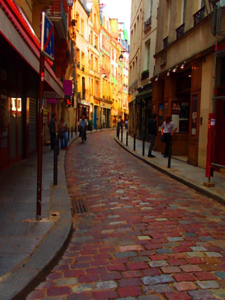 Sunny Parisian street with cobblestone