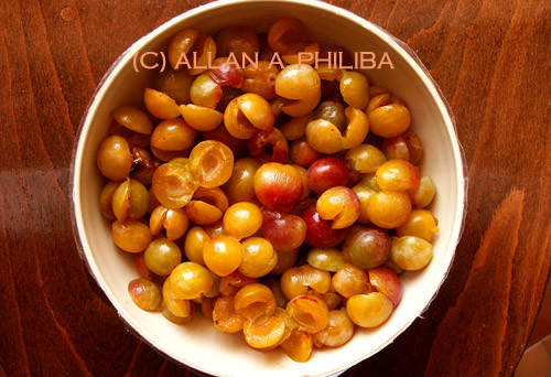 Bowl of pitted mirabelles