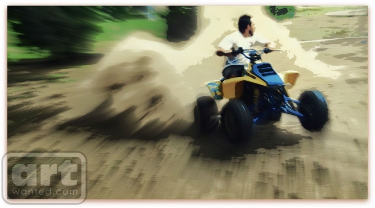 My son rooster tailing on his 4wheeler in color
