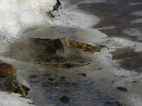 rock beaking thourhg river ice