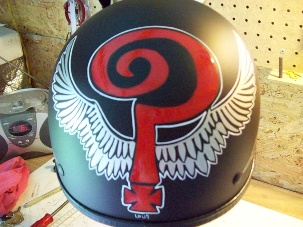 Indian Larry tribute on motorcycle helmet 