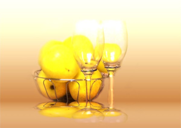 yellow apple and wine glass still life
