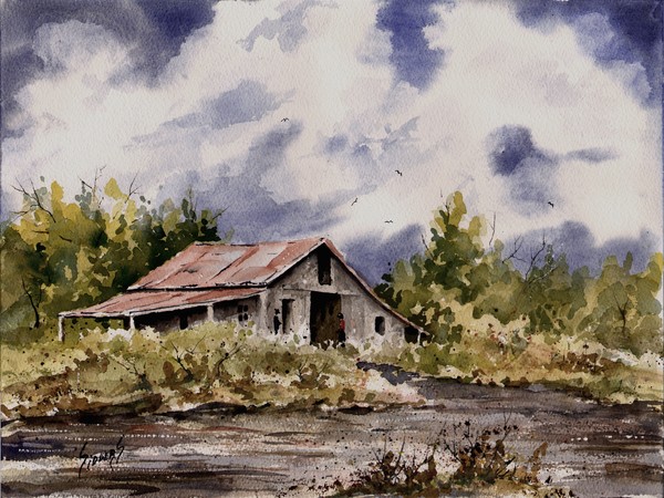 Barn Under Puffy Clouds