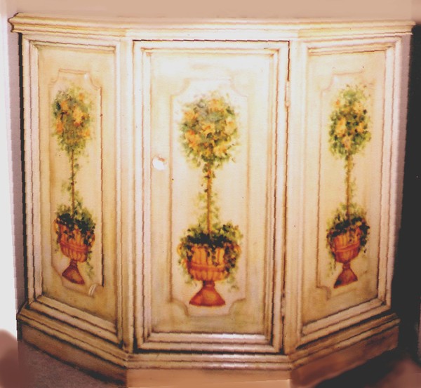 Commode with yellow rose topiaries