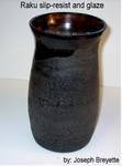metal and ash vase