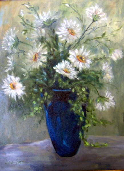 Daisy floral in blue vase