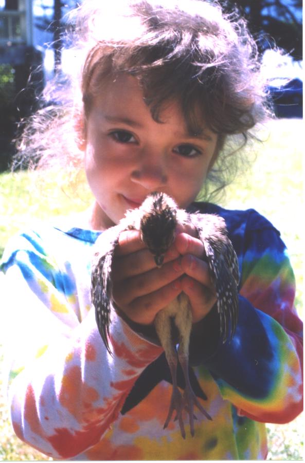 A girl and a pheasant.