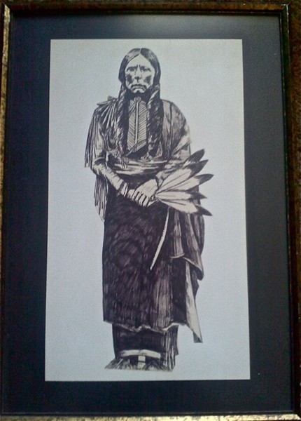 INDIAN HOLDING FEATHERS