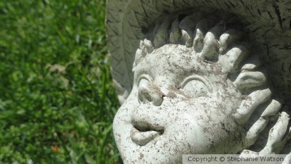 Girl Statue in Grass