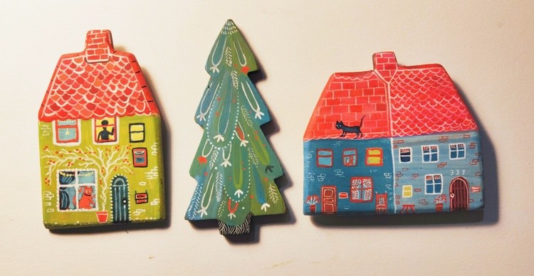 Miniature houses and pine