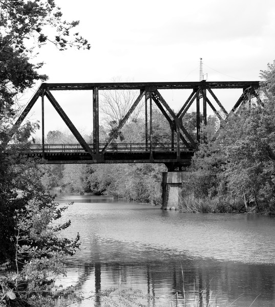 Train bridge across a Cajun bayou