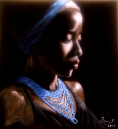 African woman with blue necklace