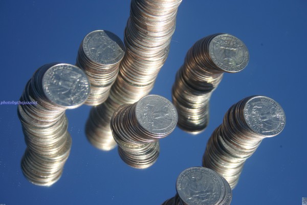 coins on a mirror