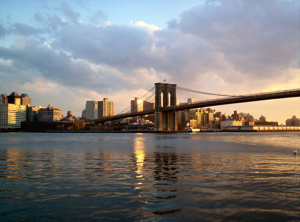 Brooklyn Bridge over East River at Sunset