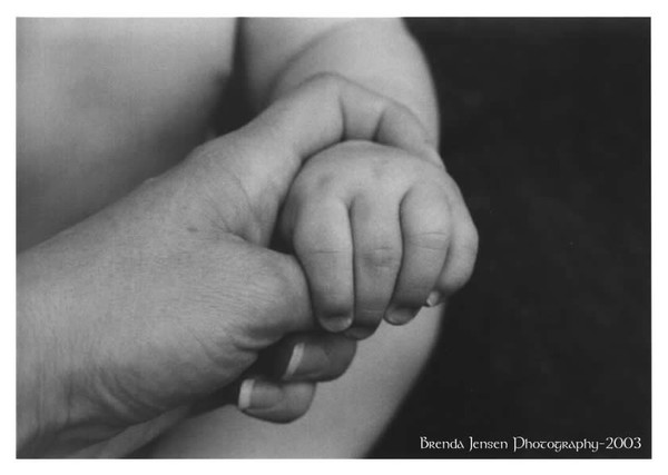 Baby hand with mom 1
