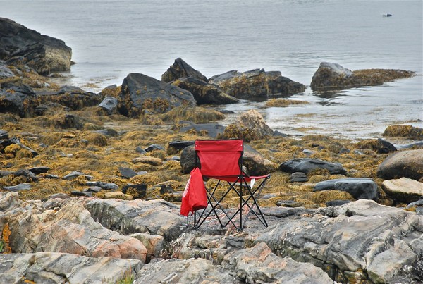 Red Chair on the Rocks