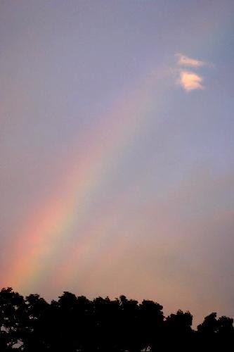 Rainbow with little clouds