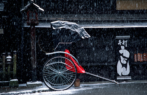Snow falling on rickshaw
