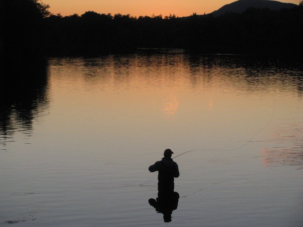 fishing at sunset