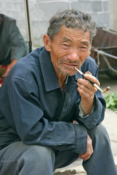 Smoking his pipe