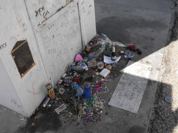 gifts people leave at her tomb.