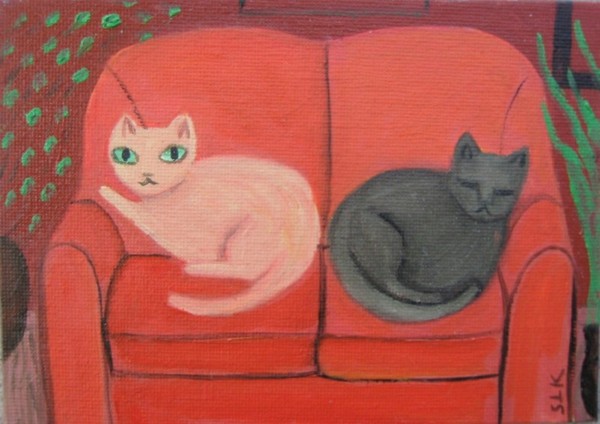 Two Cats on Orange Sofa