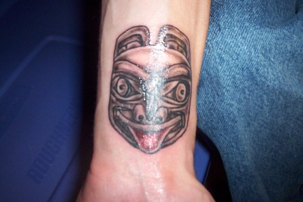 aztec mask tattoo