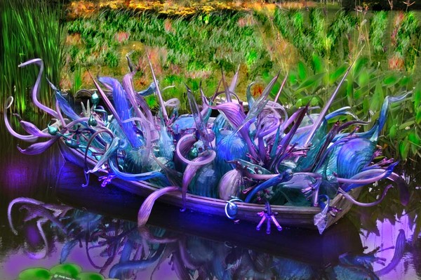 A Boat Load of Dale Chihuly's Glass in a Pond