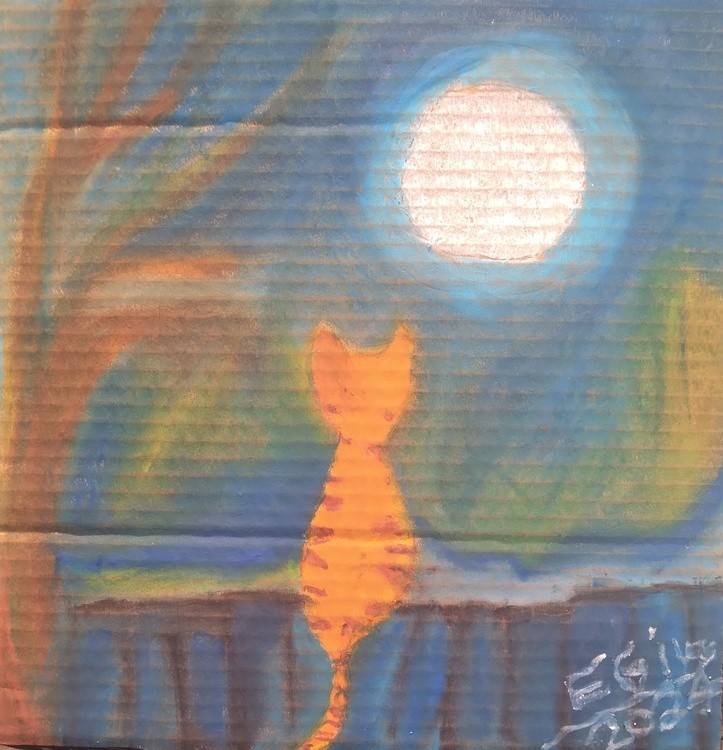 Moon Over Orange Tabby sitting on a Blue Fence