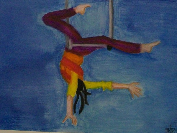 Lady upside down on a high swing