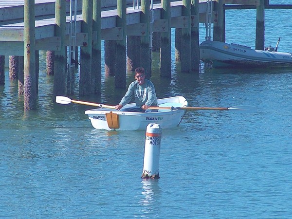 A  man with a small Dinghy