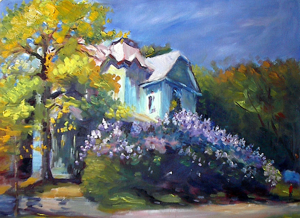 A house fenced in by lilacs 