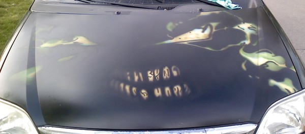 Spawn face on Ford Windstar hood