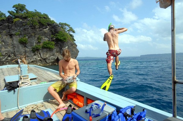 A snorkeller takes the plunge at SouthButton Islan