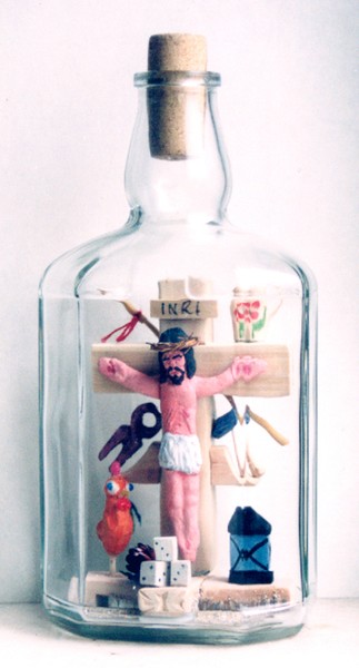 crucifix in bottle