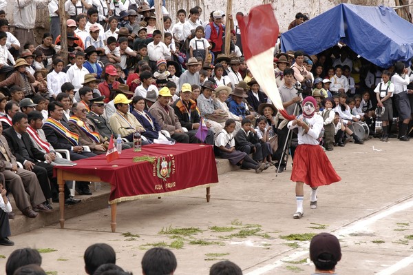 Kid with pruvian flag in parade, Accha, Cusco, Per