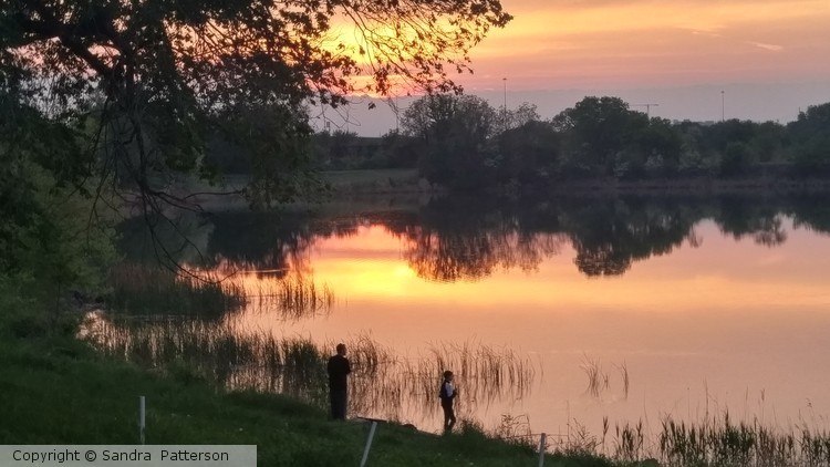 Sunset fishing lake