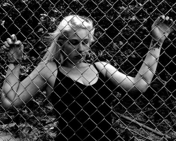 Girl behind fence #3