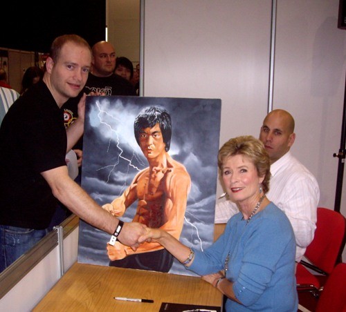 Linda Lee signs the original Painting