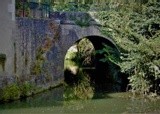 GREEN WATER UNDER THE ARCH  