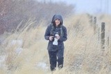 photographer in a snow storm 