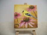 Yellow finch and Cone flowers