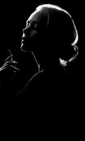 Silhouette of a Woman Smoking