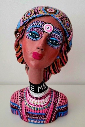 Woman clay bought and acrylic painted 