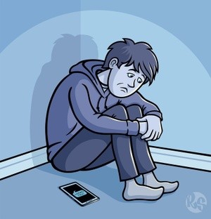 Depressed Teen Sitting In A Corner 