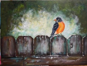robin on a frosty fence